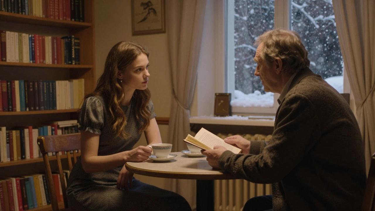 A woman and an older man share tea and a Dostoevsky book in a softly lit apartment, speaking quietly.